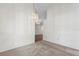 This dining room features a chandelier and neutral carpet at 9145 Fort Jefferson Blvd, Orlando, FL 32822