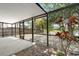 This screened patio allows for a relaxing view of the outdoors at 9145 Fort Jefferson Blvd, Orlando, FL 32822