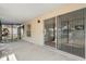 Covered patio with a sliding glass door that allows an outside view of the lake at 9145 Fort Jefferson Blvd, Orlando, FL 32822