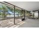The screened in patio provides a peaceful and scenic view of the lake at 9145 Fort Jefferson Blvd, Orlando, FL 32822