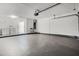 Spacious garage with washer and dryer hook ups and large area for parking vehicles or storage at 1859 Matterhorn Dr, Orlando, FL 32818