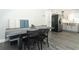 Dining area featuring a built-in dining nook, an updated light fixture and convenient access to the kitchen at 1077 Dees Dr, Oviedo, FL 32765