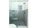 This shower features a modern design with glass doors and grey tile accents at 1077 Dees Dr, Oviedo, FL 32765