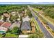Aerial view of neighborhood featuring tree lined streets and easy access to a main thoroughfare at 10930 Buckwater Ct, Orlando, FL 32817