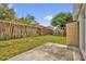 Fenced backyard with a concrete patio perfect for outdoor entertaining at 10930 Buckwater Ct, Orlando, FL 32817