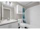Bathroom featuring white vanity, and shower at 10930 Buckwater Ct, Orlando, FL 32817
