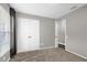 Bright bedroom featuring a closet and an adjacent open door to the rest of the home at 10930 Buckwater Ct, Orlando, FL 32817