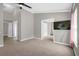 Bedroom with ceiling fan, and view to bathroom and hallway at 10930 Buckwater Ct, Orlando, FL 32817