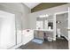Modern main bathroom featuring double vanity, soaking tub, and separate shower stall at 10930 Buckwater Ct, Orlando, FL 32817