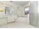 Bright bathroom featuring a shower and bathtub at 11512 Clair Pl, Clermont, FL 34711