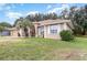 Charming single-story home with a well-maintained lawn and inviting curb appeal at 11512 Clair Pl, Clermont, FL 34711