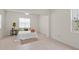 Cozy bedroom with neutral walls, bright windows, and tile flooring at 11520 Churchill St, Orlando, FL 32817