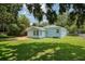 Large backyard with patio and greenery at 1225 Golfview St, Orlando, FL 32804