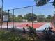 Community basketball court offers residents an outdoor recreational space for exercise and sports activities at 1230 Americana Pl, Orlando, FL 32807