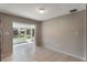 Bright dining area with tile floors and natural light at 1230 Americana Pl, Orlando, FL 32807