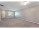 Spacious living room with lots of natural light and neutral paint at 1230 Americana Pl, Orlando, FL 32807