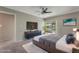 Calm main bedroom with a large sliding glass door to the lanai and neutral color palette at 1230 Americana Pl, Orlando, FL 32807
