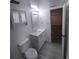 A well lit bathroom with updated vanity and fixtures at 1250 S Denning Dr # 108, Winter Park, FL 32789