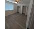 Bright bedroom with ceiling fan, and two closets at 1250 S Denning Dr # 108, Winter Park, FL 32789