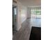Bright open living room showing sliding glass door to the exterior at 1250 S Denning Dr # 108, Winter Park, FL 32789
