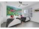 Themed bedroom with playful wall mural, comfortable twin beds, and ample natural light at 1375 Tuscana Ln # 1102, Davenport, FL 33896