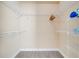 Walk-in closet with ample shelving for organized storage and neutral wall color at 1375 Tuscana Ln # 1102, Davenport, FL 33896