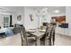 Dining area with seating and a view to the living room and kitchen for modern living at 1375 Tuscana Ln # 1102, Davenport, FL 33896