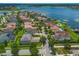 Aerial view of community homes near a lake with a locator pinpointing the property's location at 14357 United Colonies Dr, Winter Garden, FL 34787