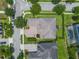 Aerial view of the home showcasing the roof, driveway, and well-manicured lawn at 14357 United Colonies Dr, Winter Garden, FL 34787