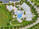 Aerial view of the community pool, clubhouse, and surrounding landscaping at 14357 United Colonies Dr, Winter Garden, FL 34787