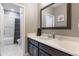 Well-lit bathroom with a vanity, sink, and a shower-tub combination with a shower curtain at 14357 United Colonies Dr, Winter Garden, FL 34787