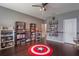 Bonus room with shelving, a ceiling fan, and hardwood flooring at 14357 United Colonies Dr, Winter Garden, FL 34787
