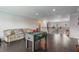 Game room with hardwood floors and foosball table at 14357 United Colonies Dr, Winter Garden, FL 34787
