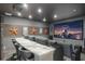 Home theater with comfortable seating, a large screen, and surround sound for an immersive viewing experience at 14357 United Colonies Dr, Winter Garden, FL 34787