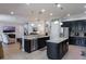 Open concept kitchen with granite countertops, island, and stainless steel appliances at 14357 United Colonies Dr, Winter Garden, FL 34787