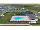 Aerial view of community pool, tennis courts, and recreation area at 16055 Silver Brook Way, Winter Garden, FL 34787