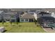 Aerial view of backyard with solar panels, screened-in porch and pool at 16055 Silver Brook Way, Winter Garden, FL 34787