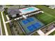 Community amenities feature two pickleball courts, pool and lounge area, and recreation spaces, all beautifully landscaped at 16055 Silver Brook Way, Winter Garden, FL 34787