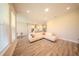 Bright living room featuring hardwood floors, recessed lighting, and an open concept layout at 16055 Silver Brook Way, Winter Garden, FL 34787