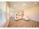 Bright living room featuring hardwood floors, recessed lighting, and an open concept layout at 16055 Silver Brook Way, Winter Garden, FL 34787