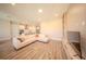 Bright living room featuring hardwood floors, recessed lighting, and an open concept layout at 16055 Silver Brook Way, Winter Garden, FL 34787