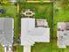 Aerial view of the home featuring a large yard and brick patio at 1616 Golden Poppy Ct, Orlando, FL 32824