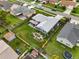 Aerial view of a home showcasing the spacious backyard, including a patio and garden at 1616 Golden Poppy Ct, Orlando, FL 32824