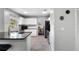Bright kitchen featuring white cabinets, modern appliances, and functional layout at 1616 Golden Poppy Ct, Orlando, FL 32824