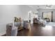 Open living space with hardwood floors, stylish seating, and seamless flow throughout the home at 1616 Golden Poppy Ct, Orlando, FL 32824