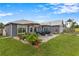 Cozy backyard patio with comfortable seating and brick pavers at 1616 Golden Poppy Ct, Orlando, FL 32824