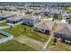 Aerial view of the backyard and neighborhood, highlighting the property's location and outdoor space at 1791 Hackberry St, Clermont, FL 34715