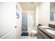 Clean bathroom featuring a shower-tub combination, granite vanity, and neutral color scheme at 1791 Hackberry St, Clermont, FL 34715