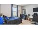 Bedroom with carpet, a bed with a character theme, dresser, and matching curtains at 1791 Hackberry St, Clermont, FL 34715