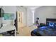 Carpeted bedroom with desk and character-themed bed and seat at 1791 Hackberry St, Clermont, FL 34715